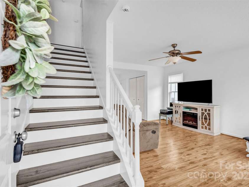 126 Newsome Road, Salisbury, NC 28146.  MLS# CAR4246225, YatesRealty ID 8180. Wide stairway leads to additional 2 bedrooms upstairs.