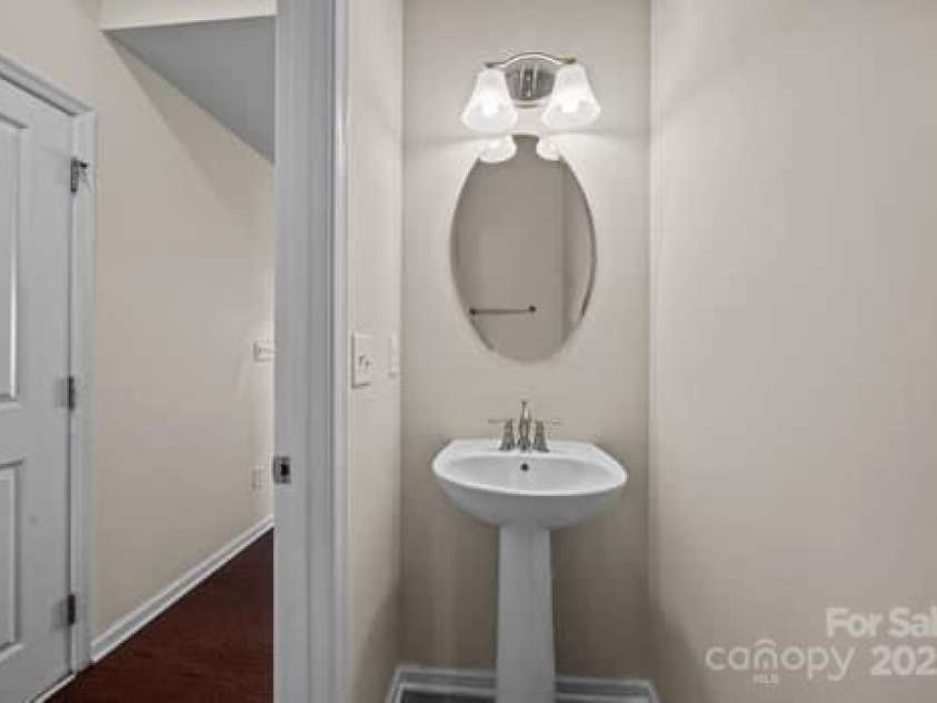 11142 Jc Murray Drive, Concord, NC 28027.  MLS# CAR4226944, YatesRealty ID 8185. Half bath downstairs