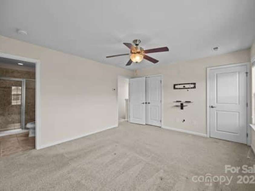 11142 Jc Murray Drive, Concord, NC 28027.  MLS# CAR4226944, YatesRealty ID 8185. Primary bedroom upstairs