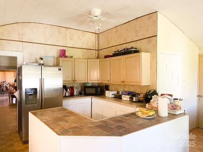 25 Highland Street, Weaverville, NC 28787.  MLS# CAR4322987, YatesRealty ID 819. 