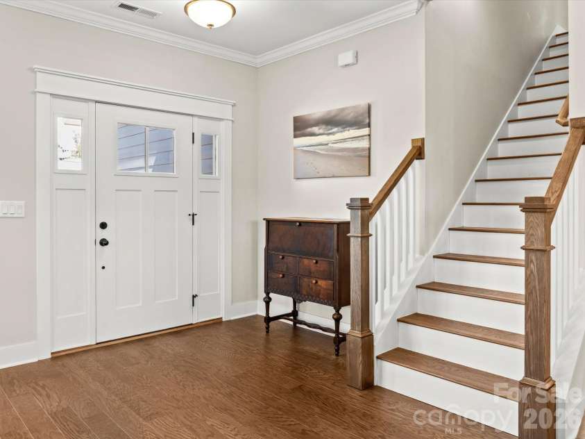 111 Ellis Lane, Arden, NC 28704.  MLS# CAR4362582, YatesRealty ID 8190. A welcoming entry with crisp architectural details 