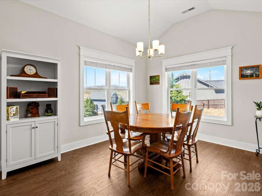 111 Ellis Lane, Arden, NC 28704.  MLS# CAR4362582, YatesRealty ID 8190. Dining area off the living area