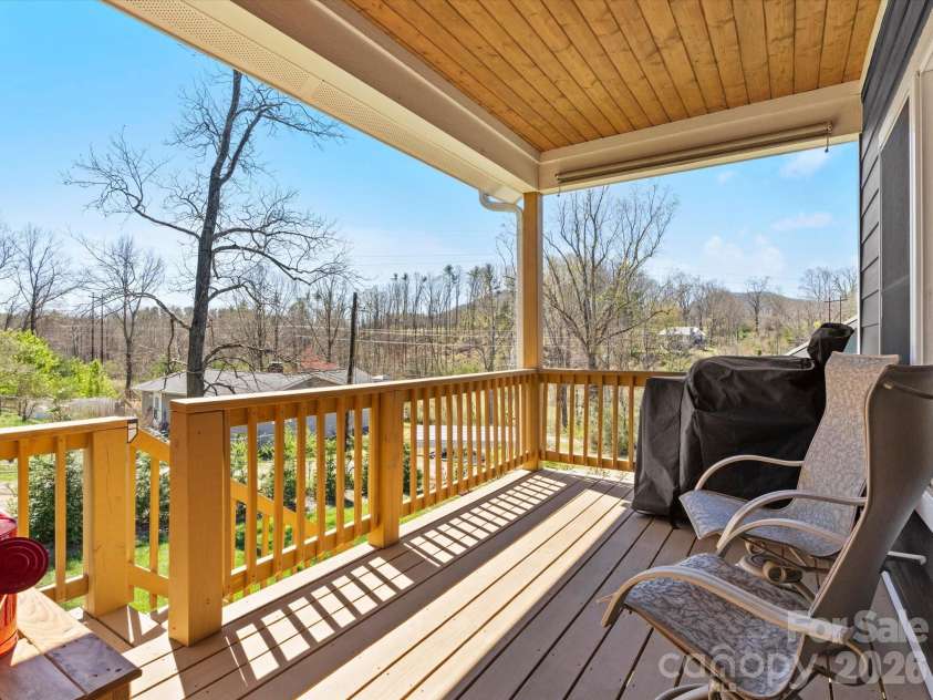 111 Ellis Lane, Arden, NC 28704.  MLS# CAR4362582, YatesRealty ID 8190. Enjoy mountain views from your covered back deck