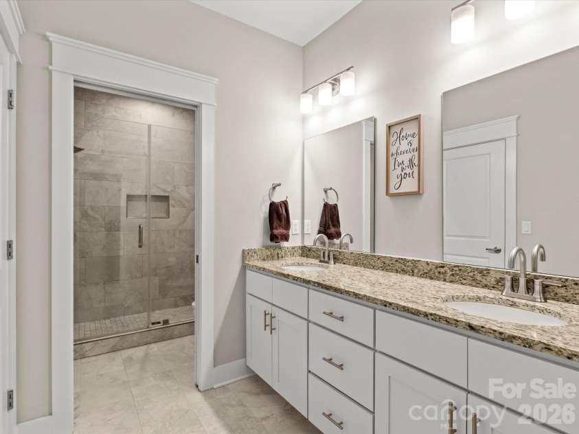 111 Ellis Lane, Arden, NC 28704.  MLS# CAR4362582, YatesRealty ID 8190. Extra wide vanity with plenty of storage