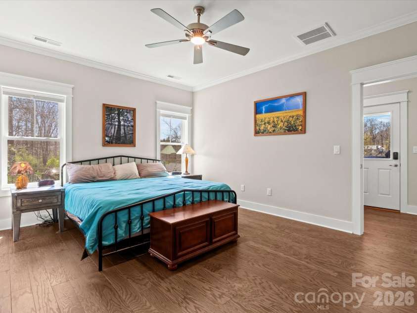 111 Ellis Lane, Arden, NC 28704.  MLS# CAR4362582, YatesRealty ID 8190. Primary bedroom on main with easy access to the back deck