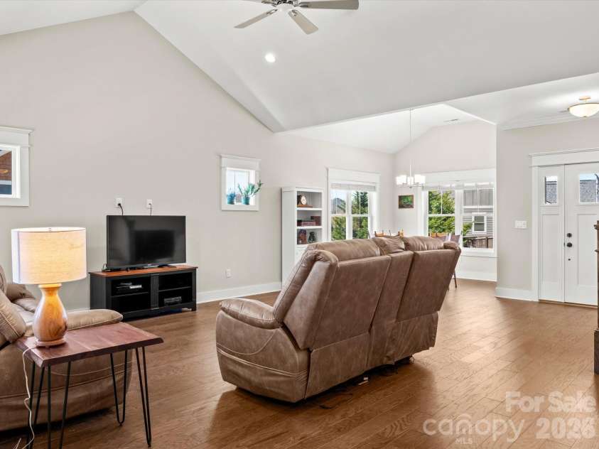 111 Ellis Lane, Arden, NC 28704.  MLS# CAR4362582, YatesRealty ID 8190. Soaring ceilings and windows in every direction fill the living and dining areas with light
