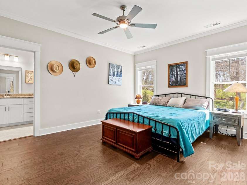 111 Ellis Lane, Arden, NC 28704.  MLS# CAR4362582, YatesRealty ID 8190. The primary bedroom also features a large en suite full bathroom