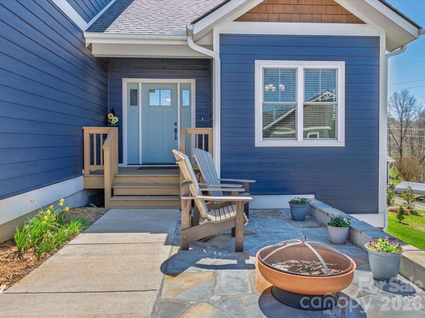 111 Ellis Lane, Arden, NC 28704.  MLS# CAR4362582, YatesRealty ID 8190. Watch the sunset from your patio
