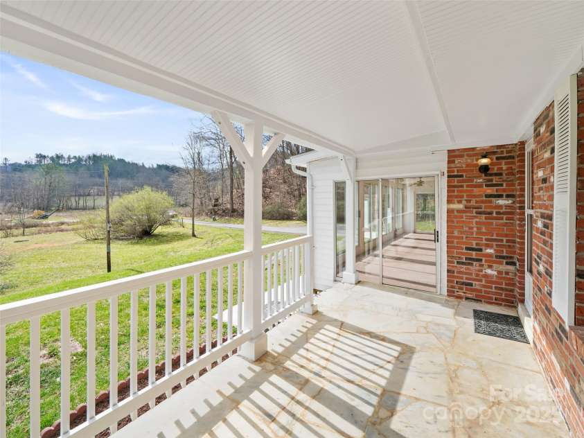 1040 Prices Creek Road, Burnsville, NC 28714.  MLS# CAR4230576, YatesRealty ID 8192. Front Porch