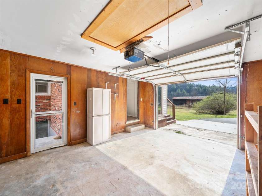 1040 Prices Creek Road, Burnsville, NC 28714.  MLS# CAR4230576, YatesRealty ID 8192. Garage