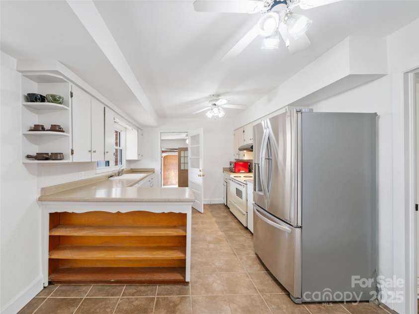 1040 Prices Creek Road, Burnsville, NC 28714.  MLS# CAR4230576, YatesRealty ID 8192. Kitchen