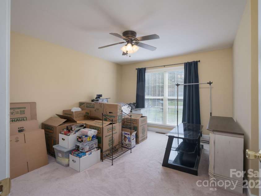 921 Snow Prince Lane, York, SC 29745.  MLS# CAR4244172, YatesRealty ID 8197. Bedroom 3 (current packing room)