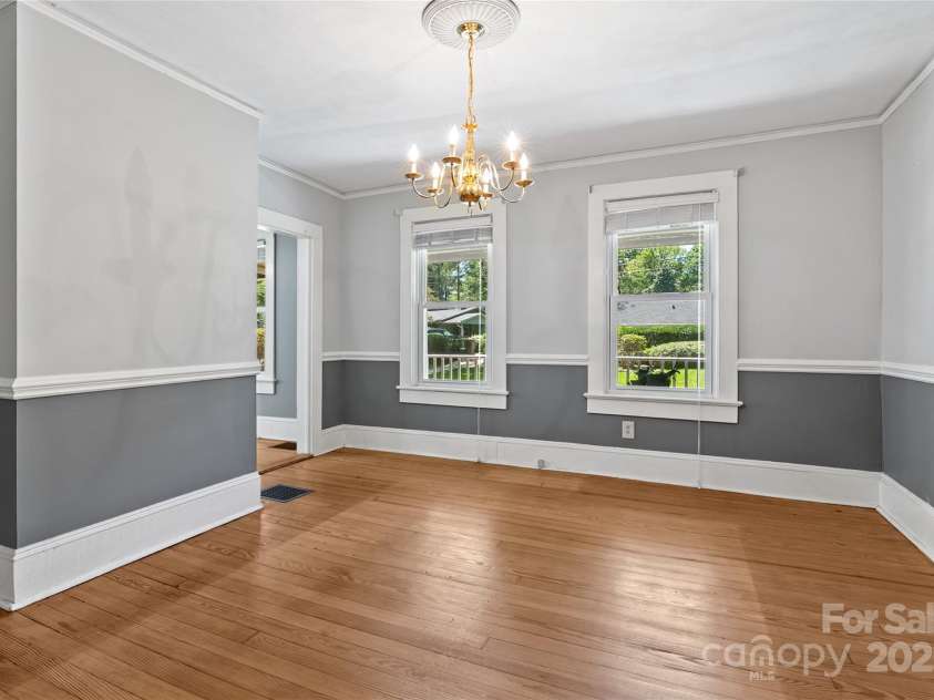 80 Laurel Avenue, Tryon, NC 28782.  MLS# CAR4299418, YatesRealty ID 820. Dining room main level.
