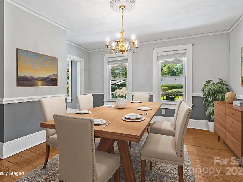 80 Laurel Avenue, Tryon, NC 28782.  MLS# CAR4299418, YatesRealty ID 820. Dining room off of the living room. 