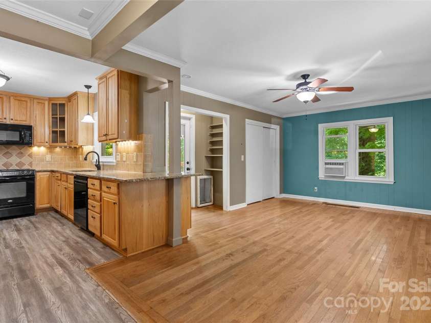 80 Laurel Avenue, Tryon, NC 28782.  MLS# CAR4299418, YatesRealty ID 820. New Kitchen and large family room.