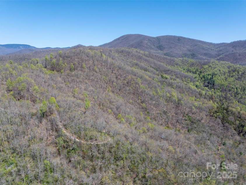 318 Brown Mountain Drive, Cullowhee, NC 28723.  MLS# CAR4235887, YatesRealty ID 8200. Brown Mountain Road (Private) and shared ROW with 579 Brown Mountain Road.