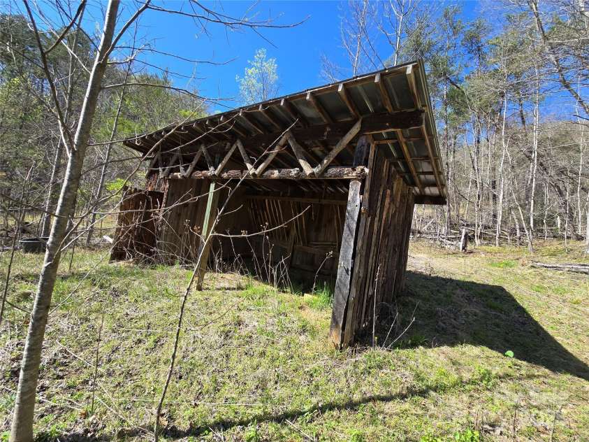 318 Brown Mountain Drive, Cullowhee, NC 28723.  MLS# CAR4235887, YatesRealty ID 8200. One of two Horse Sheds on the property. This one is at the 7+/- care pasture along John's Creek.