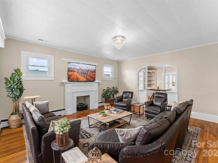 88 State Street, Marion, NC 28752.  MLS# CAR4242716, YatesRealty ID 8203. Virtually Staged Living Room