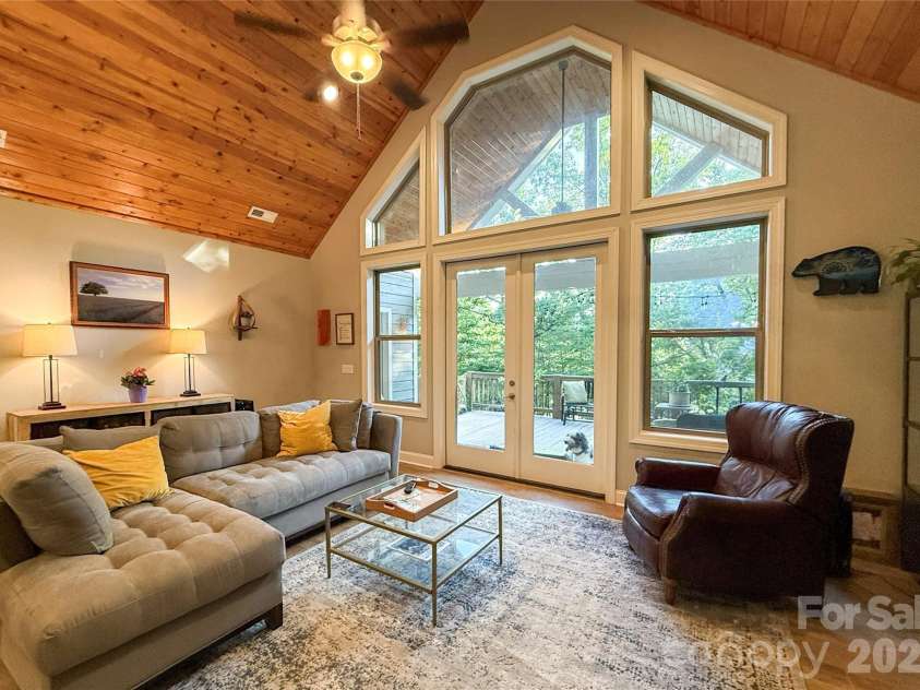 297 Paradise Point, Lake Lure, NC 28746.  MLS# CAR4361894, YatesRealty ID 8212. Rustic charm and clean modern design