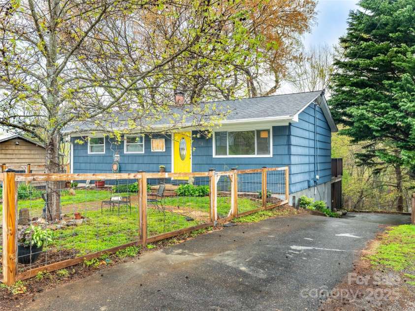64 Greeley Street, Asheville, NC 28806.  MLS# CAR4244808, YatesRealty ID 8215. 2 driveways, one on each side of the home.