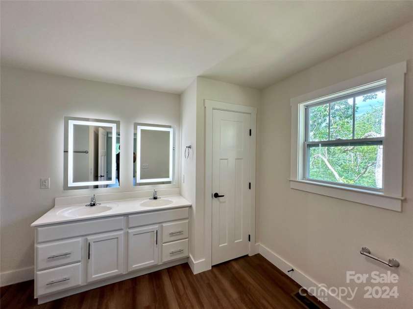 200 Cascade Ridge Road, Fairview, NC 28730.  MLS# CAR4171473, YatesRealty ID 8217. Owner's Bathroom