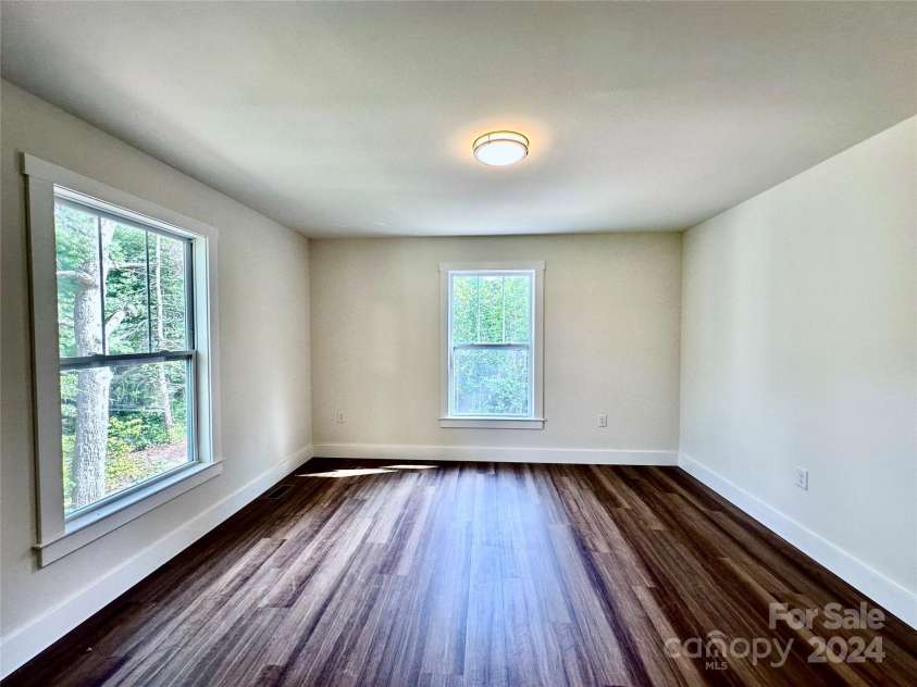 200 Cascade Ridge Road, Fairview, NC 28730.  MLS# CAR4171473, YatesRealty ID 8217. Owner's Bedroom