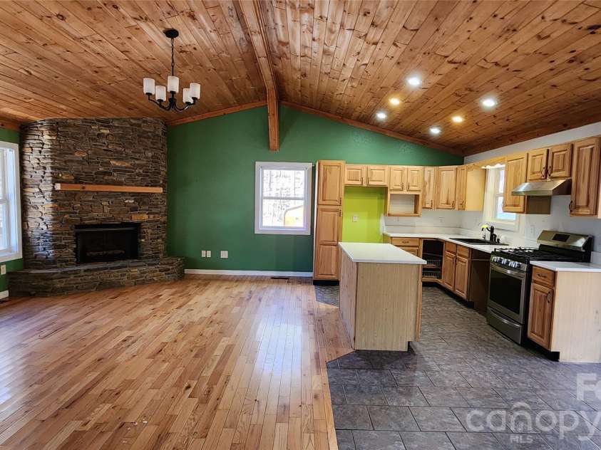 115 Old Camptown Drive, Hayesville, NC 28904.  MLS# CAR4337548, YatesRealty ID 8218. Lovely great room