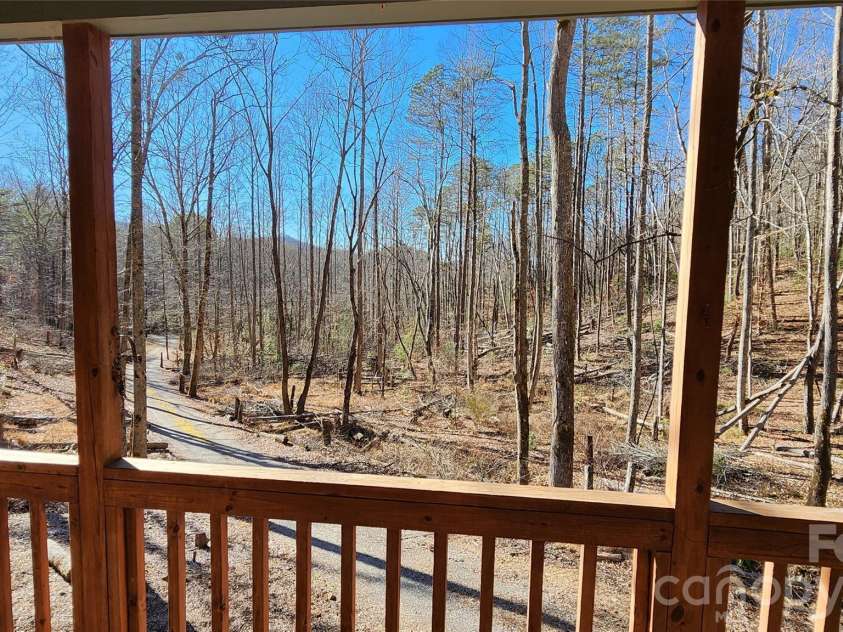 115 Old Camptown Drive, Hayesville, NC 28904.  MLS# CAR4337548, YatesRealty ID 8218. Sit on front porch and listen to mountain stream and enjoy peace and quiet