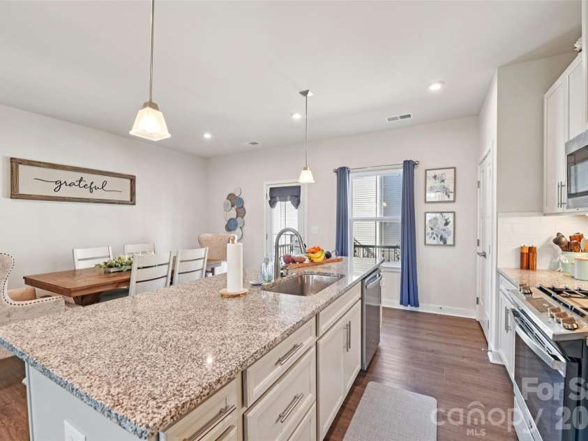1244 Newell Towns Lane, Charlotte, NC 28262.  MLS# CAR4344196, YatesRealty ID 8225. Second Floor Open Kitchen 