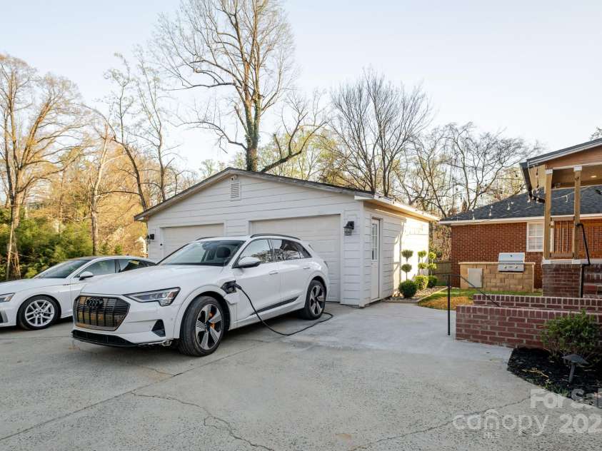 1937 Wilmore Drive, Charlotte, NC 28203.  MLS# CAR4229249, YatesRealty ID 8227. Wide two car garage with charging station