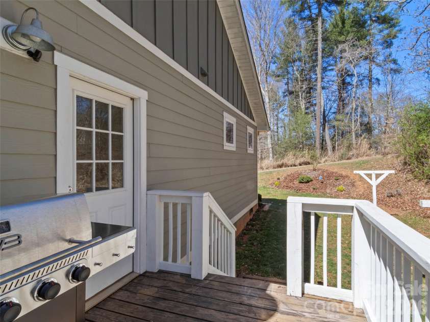 80 McKENZIE Drive, Marshall, NC 28753.  MLS# CAR4365185, YatesRealty ID 8227. Back deck for relaxing in the sun.