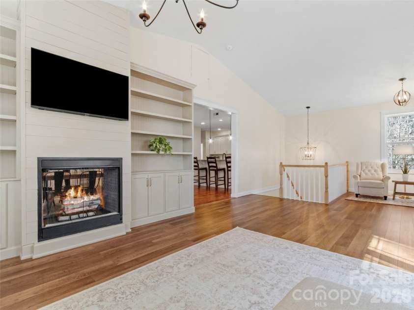 80 McKENZIE Drive, Marshall, NC 28753.  MLS# CAR4365185, YatesRealty ID 8227. Cozy up in front of the see thru fireplace!
