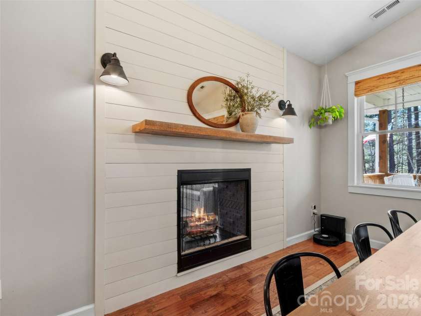 80 McKENZIE Drive, Marshall, NC 28753.  MLS# CAR4365185, YatesRealty ID 8227. Double sided electric fireplace, plumbed for propane