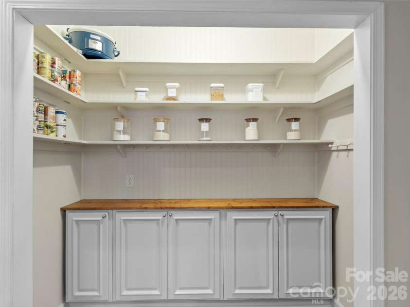 80 McKENZIE Drive, Marshall, NC 28753.  MLS# CAR4365185, YatesRealty ID 8227.  Pantry with lots of storage!