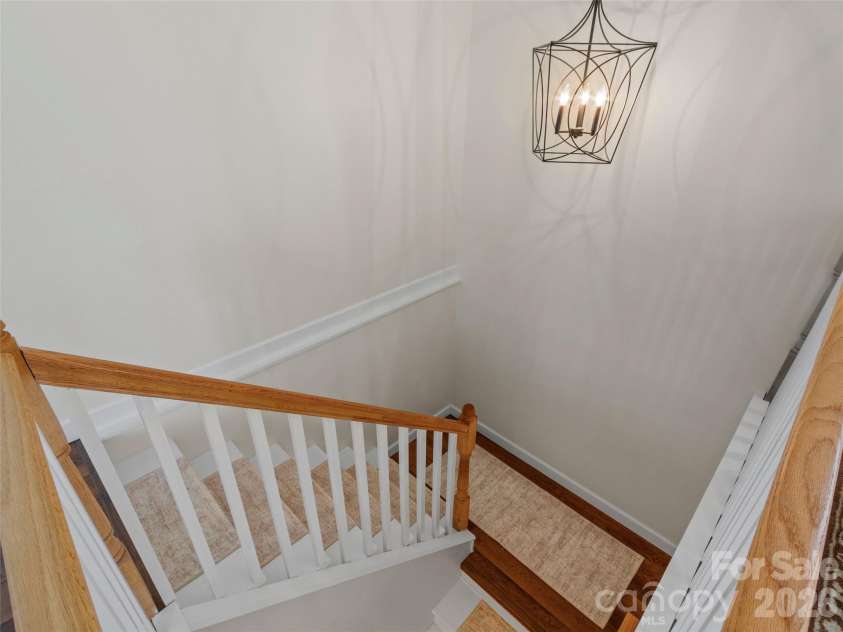 80 McKENZIE Drive, Marshall, NC 28753.  MLS# CAR4365185, YatesRealty ID 8227. Stairs to bonus rooms.