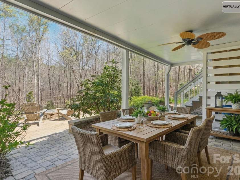 5420 Ashbury Lane, Davidson, NC 28036.  MLS# CAR4328115, YatesRealty ID 8229. Covered Patio - Virtually Staged