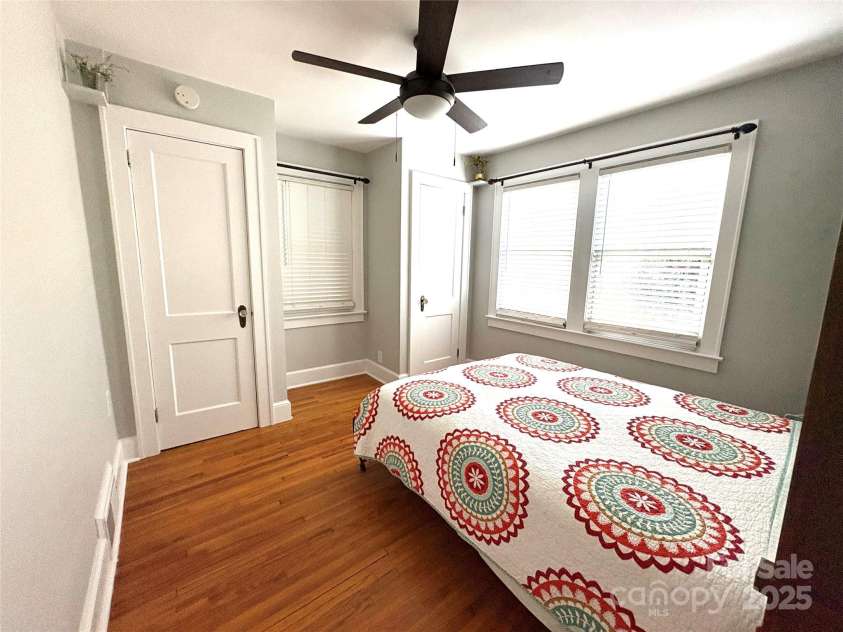 114 Broadway Avenue, Tryon, NC 28782.  MLS# CAR4322856, YatesRealty ID 823. Main floor bedroom with two closets.