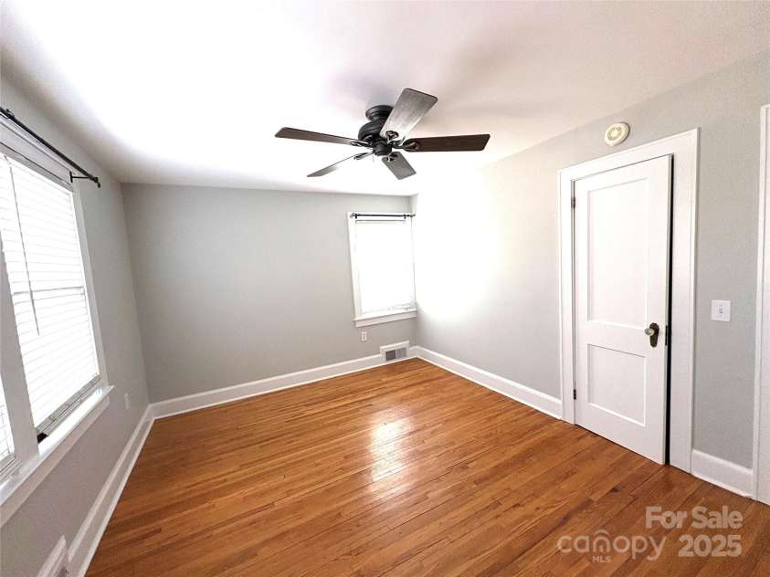 114 Broadway Avenue, Tryon, NC 28782.  MLS# CAR4322856, YatesRealty ID 823. Primary bedroom on main floor.