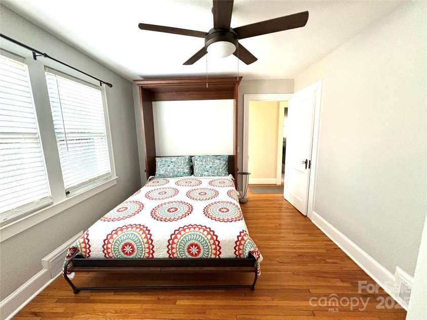 114 Broadway Avenue, Tryon, NC 28782.  MLS# CAR4322856, YatesRealty ID 823. This bedroom has a custom Murphy bed that conveys with the home. Perfect for turning the room into a flex space or home office!