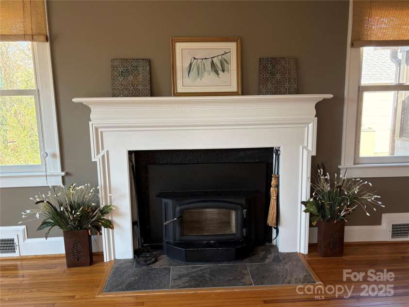 114 Broadway Avenue, Tryon, NC 28782.  MLS# CAR4322856, YatesRealty ID 823. Wood burning fireplace insert with blower guarantees cozy winter evenings!
