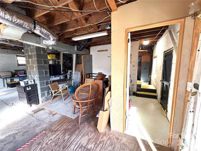 114 Broadway Avenue, Tryon, NC 28782.  MLS# CAR4322856, YatesRealty ID 823. Yet another section of the basement.