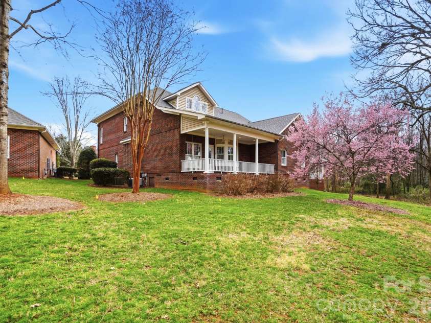 1173 Bunch Drive, Statesville, NC 28677.  MLS# CAR4351005, YatesRealty ID 8230. Back of Home w/ covered porch