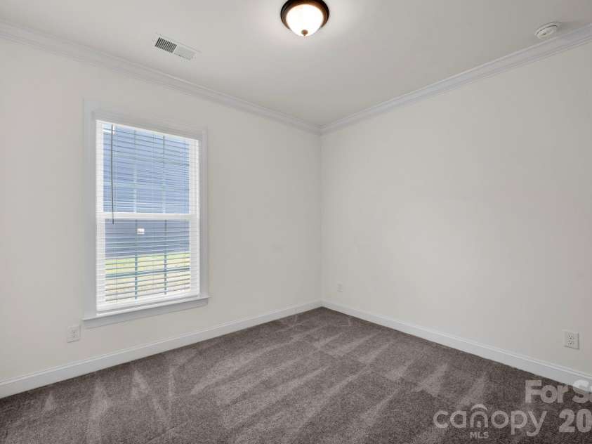 4650 Monument Valley Drive, Indian Land, SC 29707.  MLS# CAR4307096, YatesRealty ID 8235. Third Main Level Bedroom