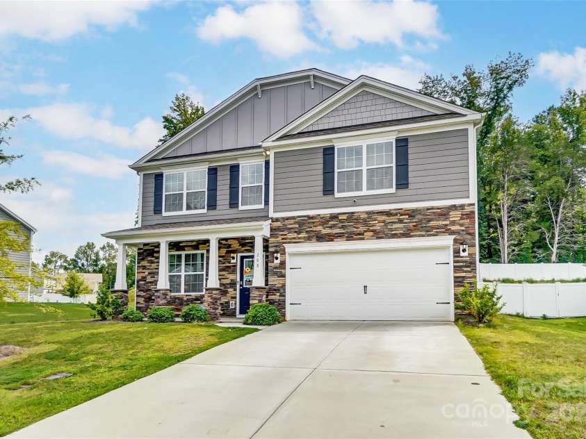 208 Wildflower Drive, Locust, NC 28097.  MLS# CAR4176933, YatesRealty ID 8240. 