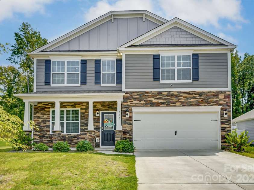 208 Wildflower Drive, Locust, NC 28097.  MLS# CAR4176933, YatesRealty ID 8240. 
