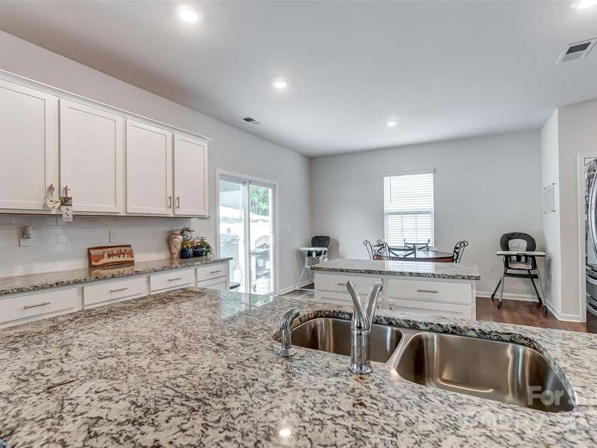 208 Wildflower Drive, Locust, NC 28097.  MLS# CAR4176933, YatesRealty ID 8240. 