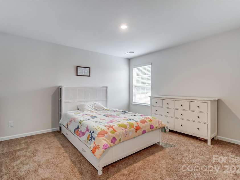 208 Wildflower Drive, Locust, NC 28097.  MLS# CAR4176933, YatesRealty ID 8240. 