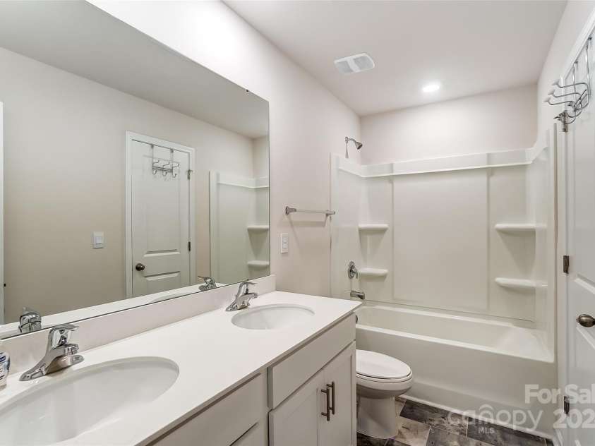 208 Wildflower Drive, Locust, NC 28097.  MLS# CAR4176933, YatesRealty ID 8240. 