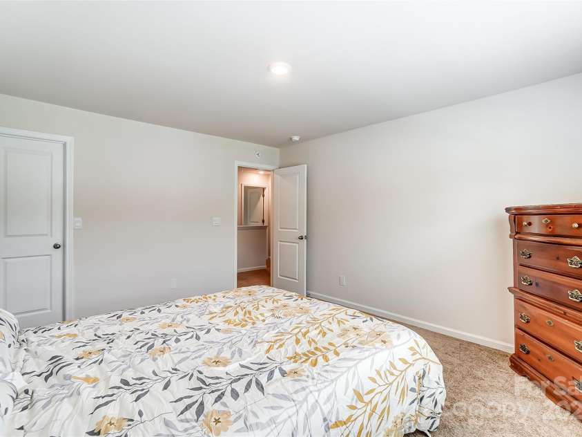 208 Wildflower Drive, Locust, NC 28097.  MLS# CAR4176933, YatesRealty ID 8240. 