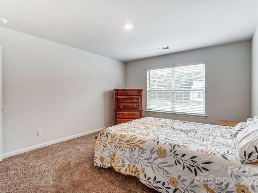 208 Wildflower Drive, Locust, NC 28097.  MLS# CAR4176933, YatesRealty ID 8240. 